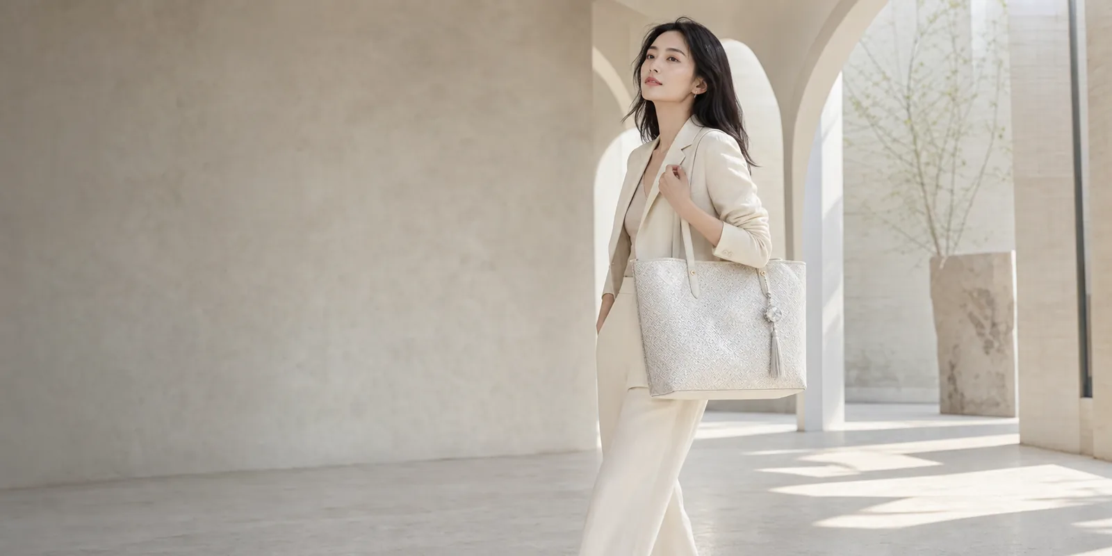 Modern styling with a white brocade handbag